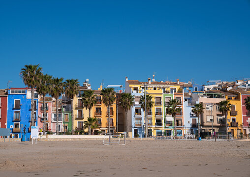 Palm Trees and Colourful Houses Villajoyosa Spain Costa Blanca blue sky