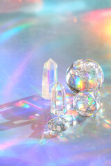 crystal quartz towers, prism, ball on abstract holographic background, Refracting vivid colors...