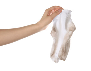 Woman holding dirty socks on white background, closeup