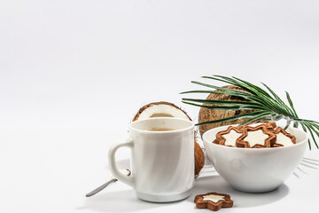 Gluten-free and lactose-free coconut cookies. Homemade healthy pastries, green tea, sunny morning