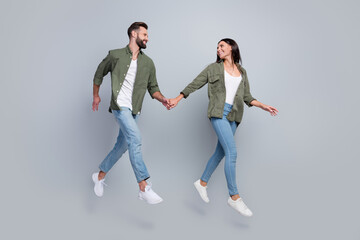 Naklejka na ściany i meble Full length photo of affectionate spouses lady guy jump go boutique open discount isolated over grey color background