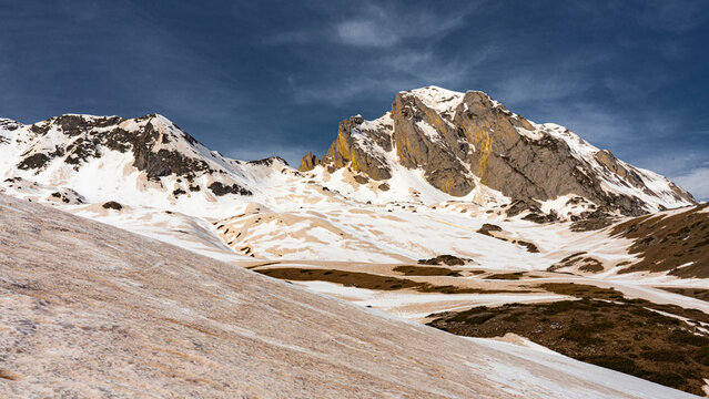 Sahara sand falls make red spots on the Pyrenees snow - Powered by Adobe