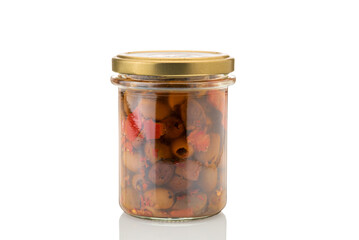 Pitted olives in glass jar, stoned olives in oil with peppers and chilli. Isolated on white, clipping path