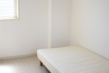 白い部屋とベッド