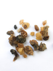 Obraz premium Myrrh tree Resin, frozen incense resin on a white background, soft focus, macro photography