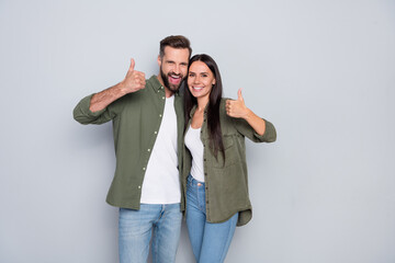 Photo of young cheerful married couple show thumbs-up advertise select perfect ideal isolated over...