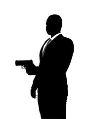 Silhouette of a suited gunman holding a pistol. Hired detective. whith clipping path.