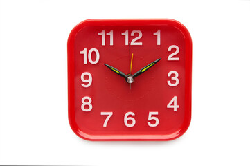 Red alarm clock isolated over white background close-up with clipping path
