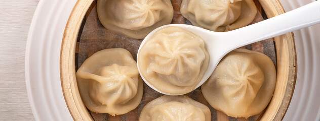 Steamed pork soup dumplings named Xiao long bao xiaolongbao in Taiwan.