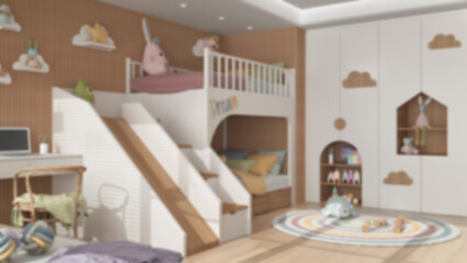 Blur background, modern wooden children bedroom in pastel tones, bunk bed with ladder and slide, parquet floor, desk with chair and laptop, carpet, toys and decors. Interior design