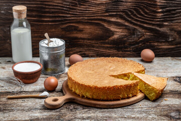 Fresh sponge cake biscuit on wooden background. Bakery background concept. banner, menu recipe place for text, top view