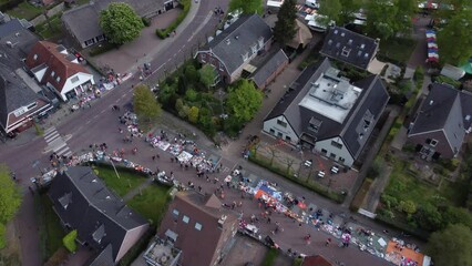 Netherlands - 27 april 2022, Blaricum: Flea market on Kingsday, Aerial topdown view