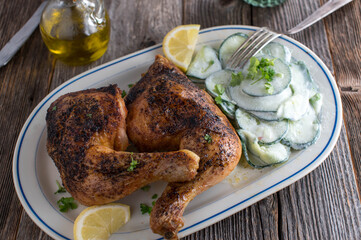 Chicken legs with cucumber salad