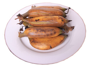Boiled banana on a white plate, perfect for a snack for breaking the fast for Muslims. clipping path