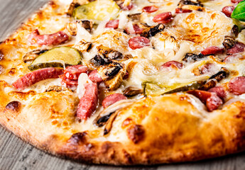 Pizza with cheese, salami, chicken meat, beef, ham, Tomato sauce, pepper