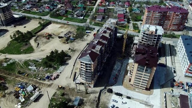 Aerial photography of a new microdistrict of the city of Essentuki with monolithic multi-storey houses under construction