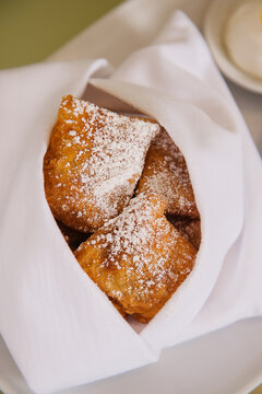 Beignets (deep-fried dough parcels, France).