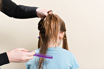Mom combs, shares her daughter's wet hair before cutting. cutting hair at home. life hacks and...