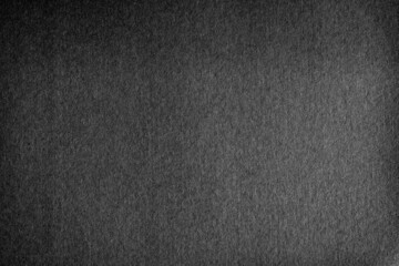 Old Dark black grainy kraft paper background texture