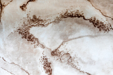 Carpet with marble texture. Laying of a carpet covering.