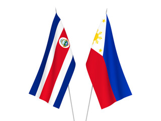 National fabric flags of Philippines and Republic of Costa Rica isolated on white background. 3d rendering illustration.