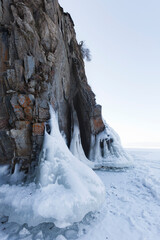 Fototapeta na wymiar Icicles in Olkhon island rock. Lake Baikal.