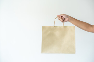 Woman carrying paper bag concept of reuse, recycle the object to zero waste. Concept of...