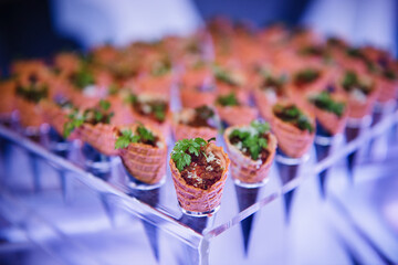 Party hors d'oeuvres served in ice cream cones