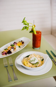 French Brunch of Tartiflette, beetroot salad and Bloody Mary.
