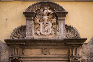 Fototapeta na wymiar Munich, Germany -April 27,2022: Details of stone ornaments on the facades of baroque buildings in the German city Munich which is the capital city in Bavaria.