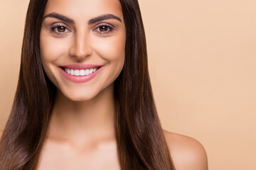 Fototapeta premium Cropped photo of attractive lady look in camera toothy smiling empty space isolated pastel color background