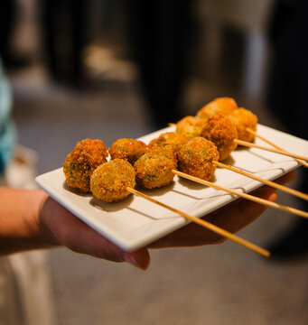 hors devours being served at an event