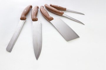 Stainless steel kitchen knife set. Creative layout. Chef, restaurant or kitchen concept. Set of...