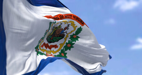 The US state flag of West Virginia waving in the wind