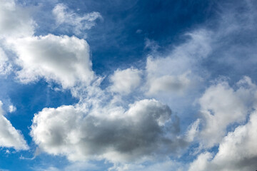 Fototapeta premium Cirrus and Stratus clouds in dramatic blue sky over Cape Town