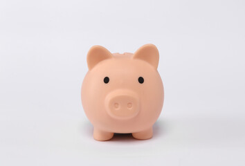 Small piggy bank isolated on white background