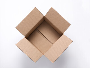 Open empty cardboard box on white background. Top view