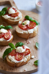 bruschetta sandwiches with cheese and basil