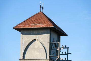 old transformer station with red roof