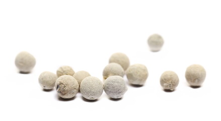 Macro grain white pepper, peppercorn isolated  