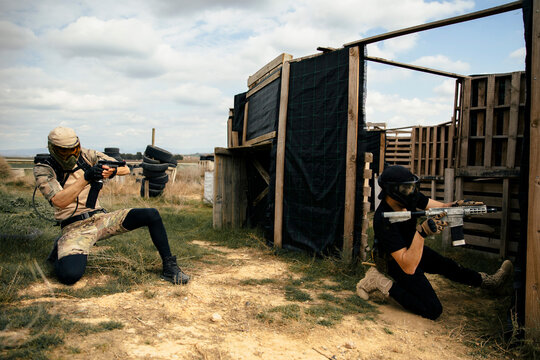 Teammates getting ready for a game of airsoft