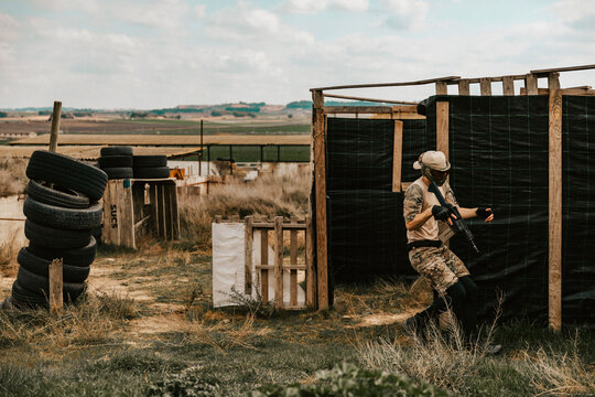 Soldier carefully advancing position in the middle of an airsoft game