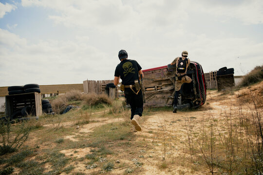 Soldiers carefully advancing position in the middle of an airsoft game