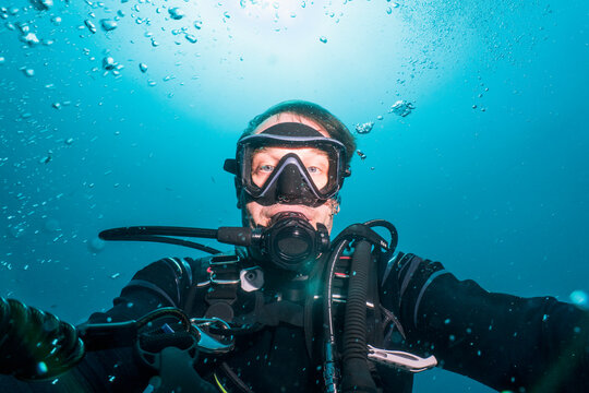 diver taking a selfie on a dive around Phuket