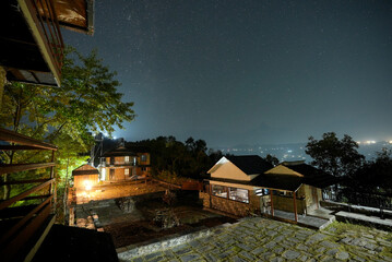 house at night WITH STARLAPSE