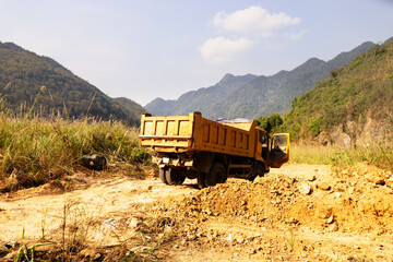 The dump truck is at the clay quarry. Sri Lanka
