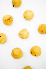 fresh Baccaurea motleyana horizontal design isolated on white background, top view