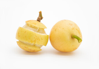 slices and whole Baccaurea motleyana isolated on white background