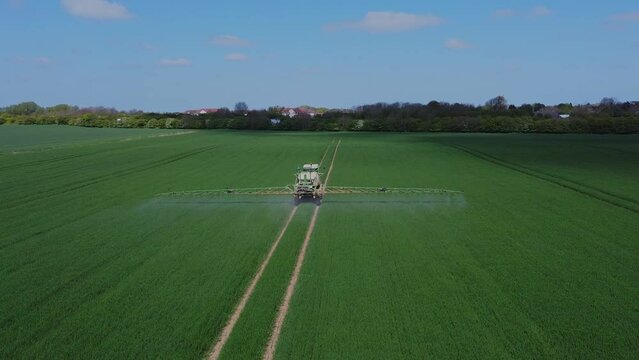 Crop Sprayer, Tractor. Using Pesticide On The Summer Crops. Filmed East Yorkshire. England. UK. 29.04.2022