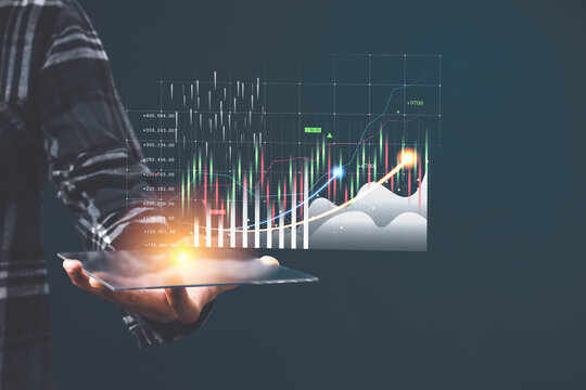 Businessman showing a growing virtual hologram stock, invest in trading.
